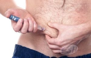 man-injecting-in-belly